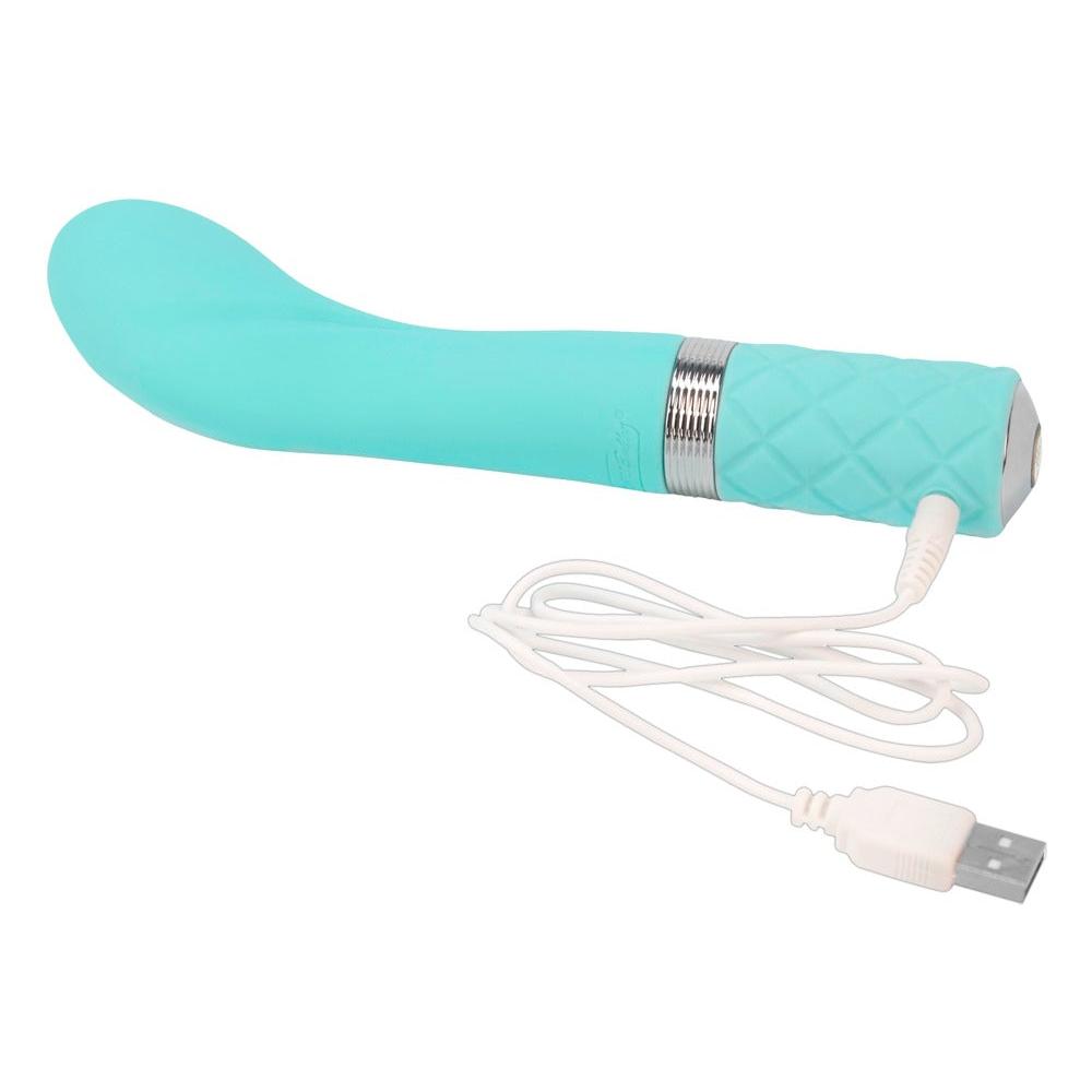 Turkis silikon G-punkt vibrator med bøyd tupp, riller og Swarovski krystaller, med hvit USB-ladekabel.
