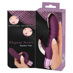 Lilla silikon Rabbit Vibe vibrator med fleksible ører, vist i hånd og i elegant emballasje.