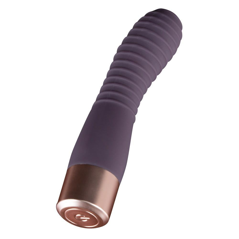 Lilla silikon vibrator med rillet overflate og rosegull base for G-punkt og klitorisstimulering.