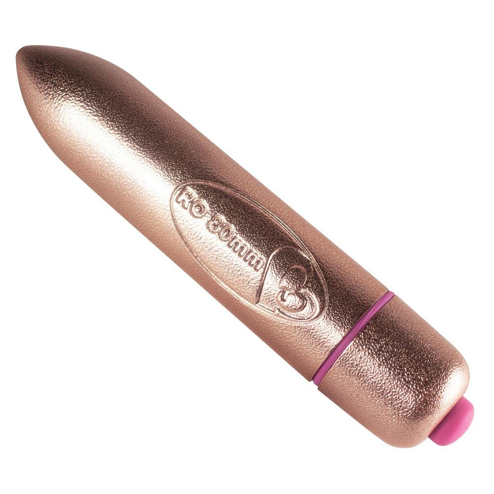RO-80 Bullet Klitorisvibrator i rosegull med spiss tupp og lilla detaljer.