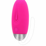 Funky egg vibrerende massasjeegg i rosa silikon med sølvdetalj og hvit snor.