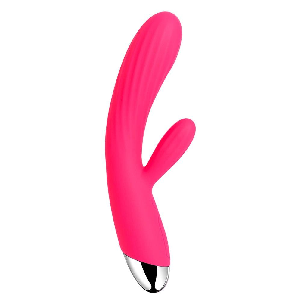 Rosa silikon rabbitvibrator med riller, varmefunksjon og sølvfarget tupp for dobbel stimulering.