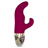 Mørk rosa silikon rabbitvibrator med buet G-punkt tupp, fleksibel klitorisstimulator og gullfarget base.