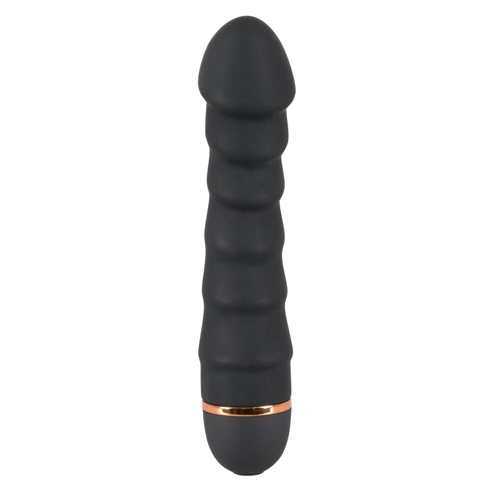Svart silikon vibrator med penisformet tupp, 5 bølger, og kobberfarget detalj i bunnen.