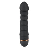 Svart silikon vibrator med penisformet tupp, 5 bølger, og kobberfarget detalj i bunnen.