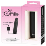 Sweet Smile svart silikon klitorisvibrator i rosa og hvit emballasje med produktinformasjon.