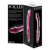 Rosa glassdildo med spiralstruktur og markert penishode, vist i og utenfor emballasjen.