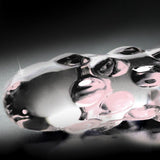 Klar glassdildo med boblete tekstur og glansfull overflate.
