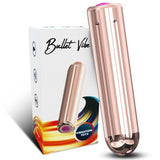 Glanset roségull bullet vibrator med lilla knapp, ved siden av en fargerik eske.
