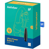 Satisfyer Ultra Power Bullet 5 klitorisvibrator i svart, diamantrillet silikon, vist ved siden av sin grønne og gule emballasje.