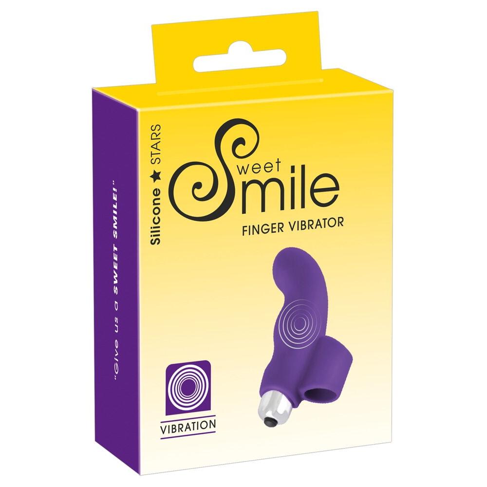 Lilla Sweet Smile silikon fingervibrator i gul og lilla eske med "Silicone Stars" og "Vibration" merking.