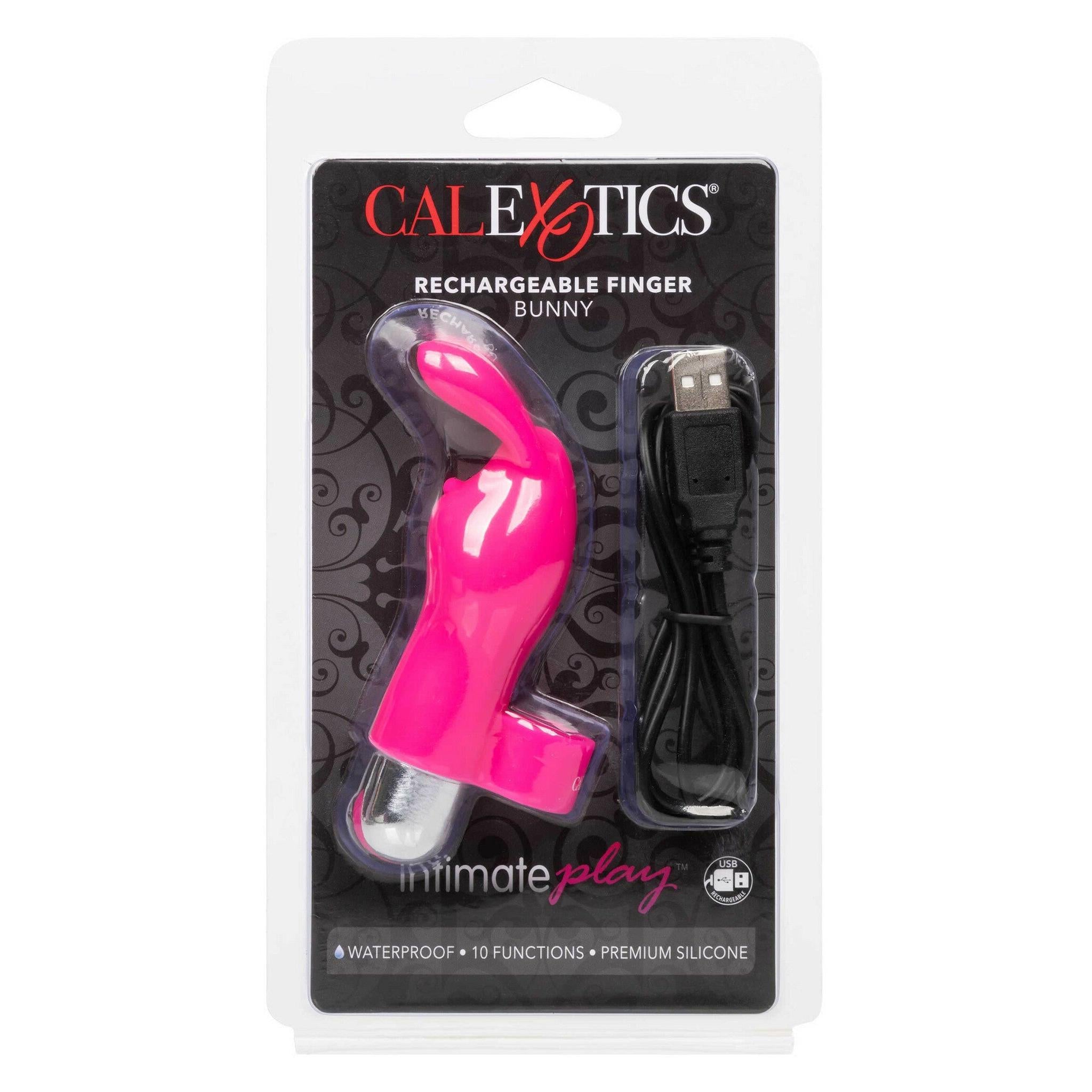Intimate Play Vibrerende Finger Kanin i rosa silikon med sølvdetaljer og USB-ladekabel i emballasje.