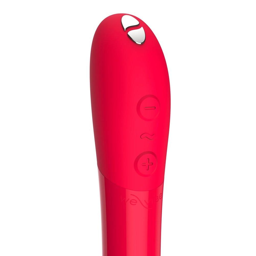Rød We-Vibe Tango X klitorisstimulator i silikon med sølvfarget tupp og kontrollknapper.