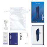 Blå We-Vibe Tango X klitorisvibrator, lader, oppbevaringspose, smøremiddel og manualer.