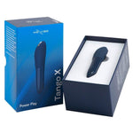 Blå We-Vibe Tango X klitorisvibrator i en åpen eske, ved siden av den lukkede produktemballasjen.