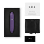 LELO Mia 3 klitorisvibrator i lilla, med ladeetui, bruksanvisning og oppbevaringspose.