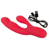 Rød silikon rabbitvibrator med dunkende funksjon og USB-ladekabel.