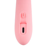 Nærbilde av den rosa Mora Neo rabbitvibratoren, som viser ladeporten og en kontrollknapp.
