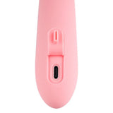 Nærbilde av den rosa Mora Neo rabbitvibratoren, som viser ladeporten og en kontrollknapp.