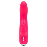 HappyRabbit Mini Rabbitvibrator i knallrosa silikon med buet tupp og kaninører.