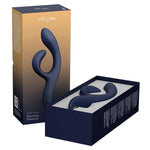 Dyp blå We-Vibe Nova 2 rabbitvibrator i silikon, vist ved siden av sin elegante emballasje.