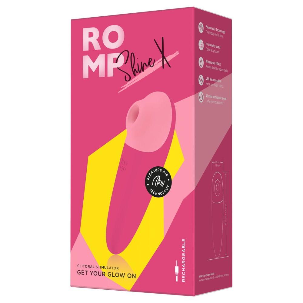 ROMP Shine X lufttrykksvibrator i rosa emballasje med produktbilde og funksjonsdetaljer.