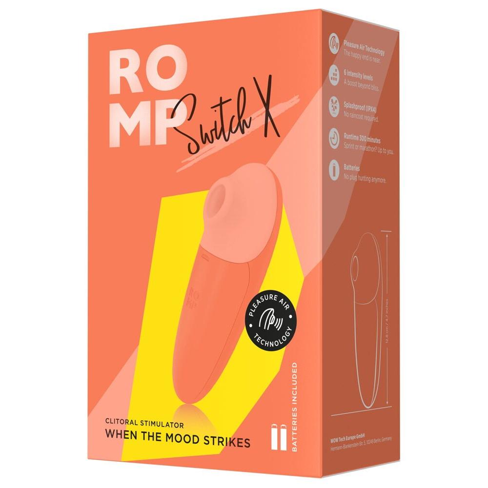 ROMP Switch X sugevibrator i ferskenfarget silikon, vist i emballasje med produktfunksjoner.