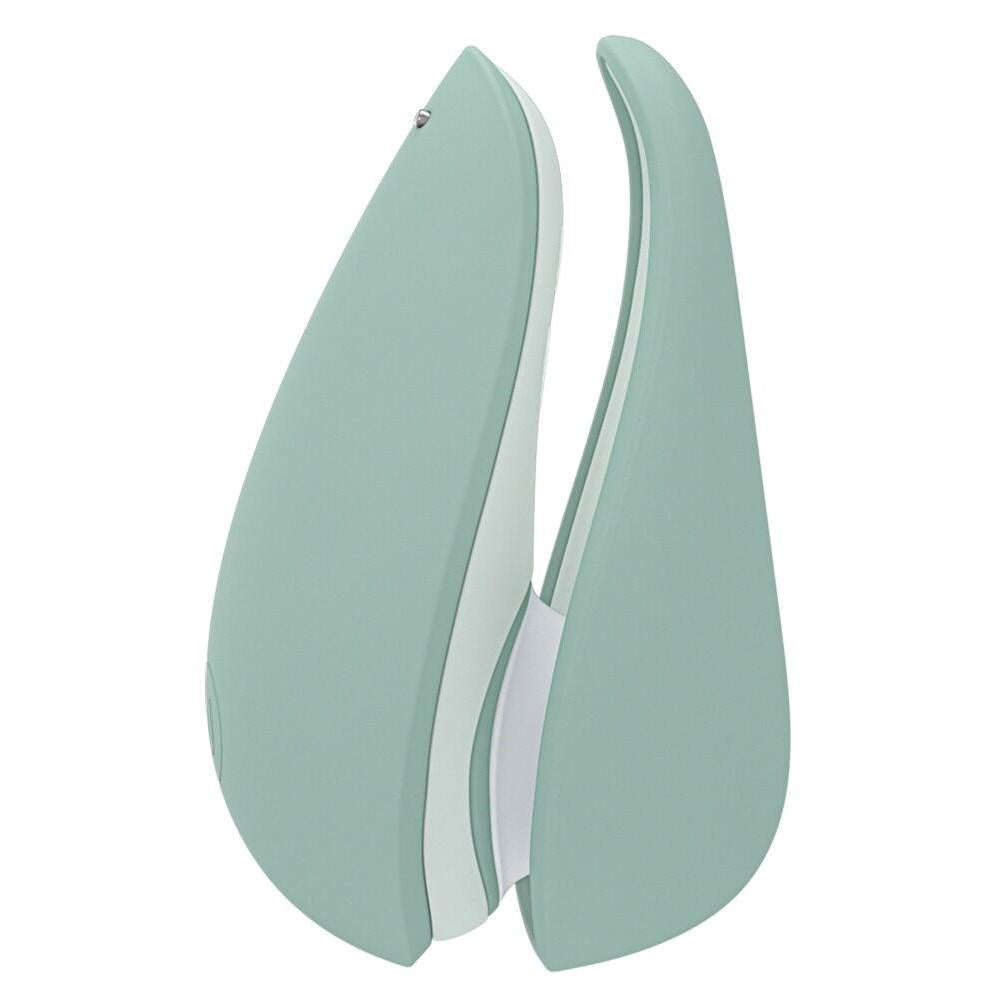 Womanizer Liberty 2 i myk mintgrønn, kompakt sugevibrator med elegant, lukket design.