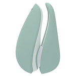 Womanizer Liberty 2 i myk mintgrønn, kompakt sugevibrator med elegant, lukket design.