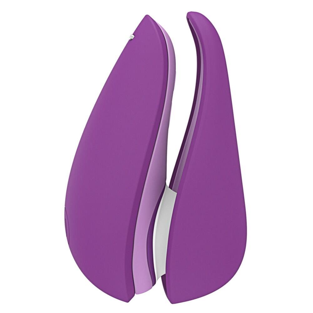 Womanizer Liberty 2 i lilla, kompakt sugevibrator med magnetdeksel og Pleasure Air-teknologi.