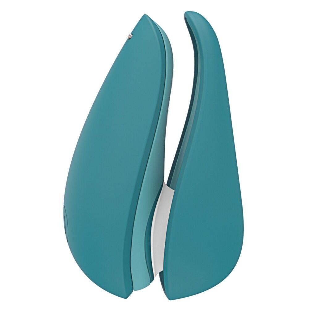 Womanizer Liberty 2 sugevibrator i mørkegrønn med elegant, kompakt design og magnetdeksel.