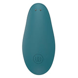 Womanizer Liberty 2 i mørkegrønn, en kompakt sugevibrator med glatt silikonoverflate og magnetdeksel.