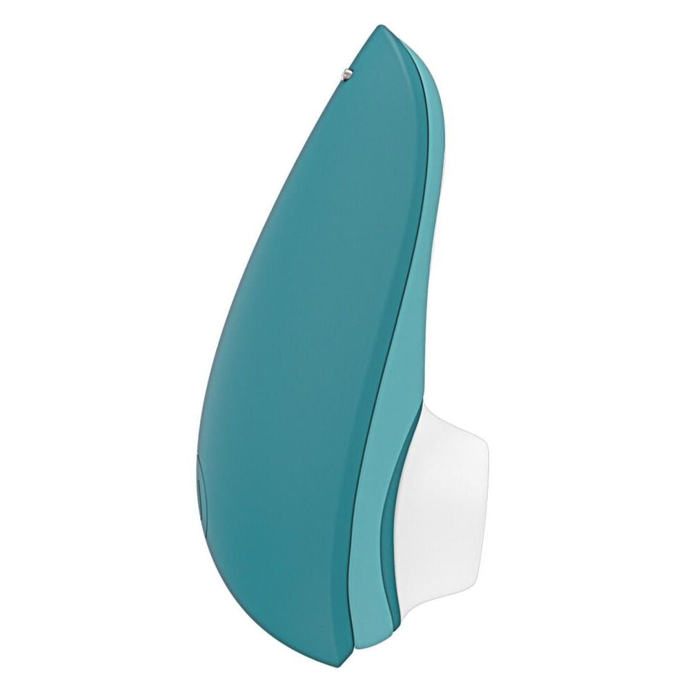 Womanizer Liberty 2 sugevibrator i mørkegrønn med hvitt magnetdeksel, kompakt og elegant design.