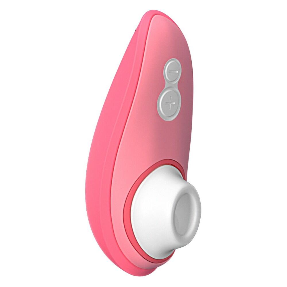 Womanizer Liberty 2 i korallrosa med hvit stimulator og grå kontrollknapper.