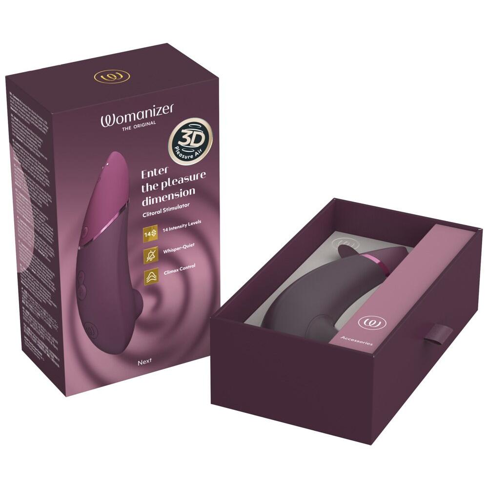 Womanizer NEXT lilla sugevibrator i elegant design med Soft Touch-overflate, vist med emballasje.