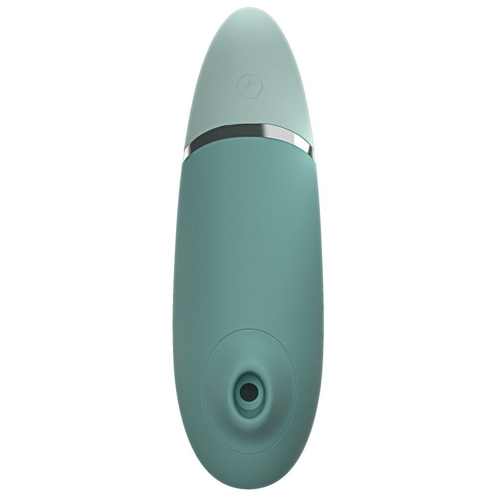 Womanizer NEXT sugevibrator i mintgrønn med Soft Touch-overflate og sølvdetalj.