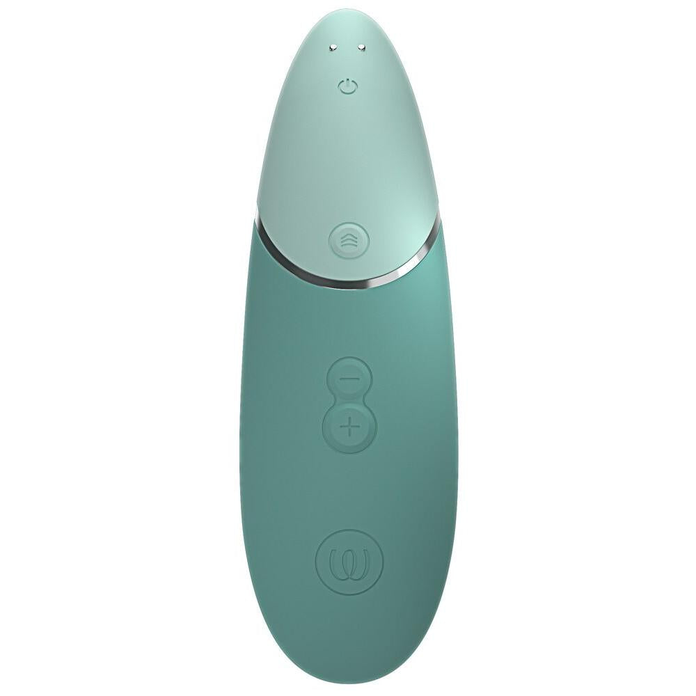 Womanizer NEXT sugevibrator i mintgrønn med Soft Touch-overflate og kontrollknapper.