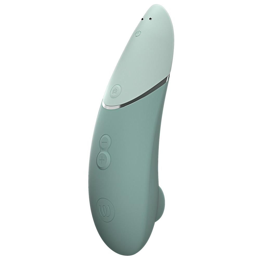 Womanizer NEXT sugevibrator i mintgrønn med Soft Touch-overflate og sølvdetaljer.