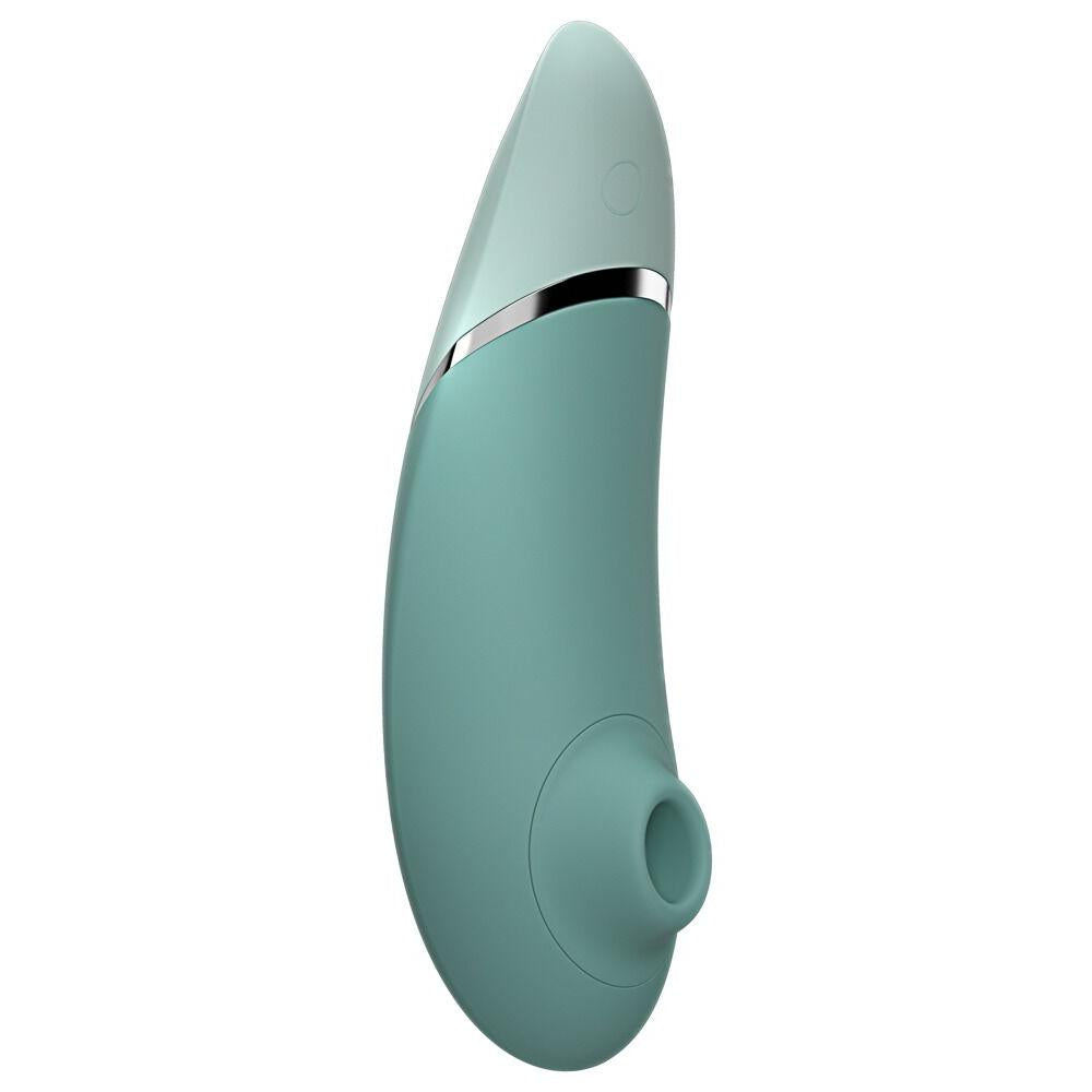 Womanizer NEXT sugevibrator i mintgrønn med elegant design og sølvdetaljer.