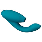 Womanizer Duo 2 rabbitvibrator i dypgrønn silikon, med klitorisstimulator og buet G-punktarm.