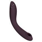Womanizer OG G-punktvibrator i burgunderrød silikon med buet design og kontrollknapper.