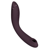 Womanizer OG G-punktvibrator i burgunderrød silikon med buet design og kontrollknapper.