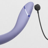 Womanizer OG lilla G-punktvibrator med Pleasure Air-teknologi og magnetisk ladekabel.