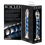 Håndlaget glassdildo med klar spiss og blå spiralstruktur, vist i emballasje.