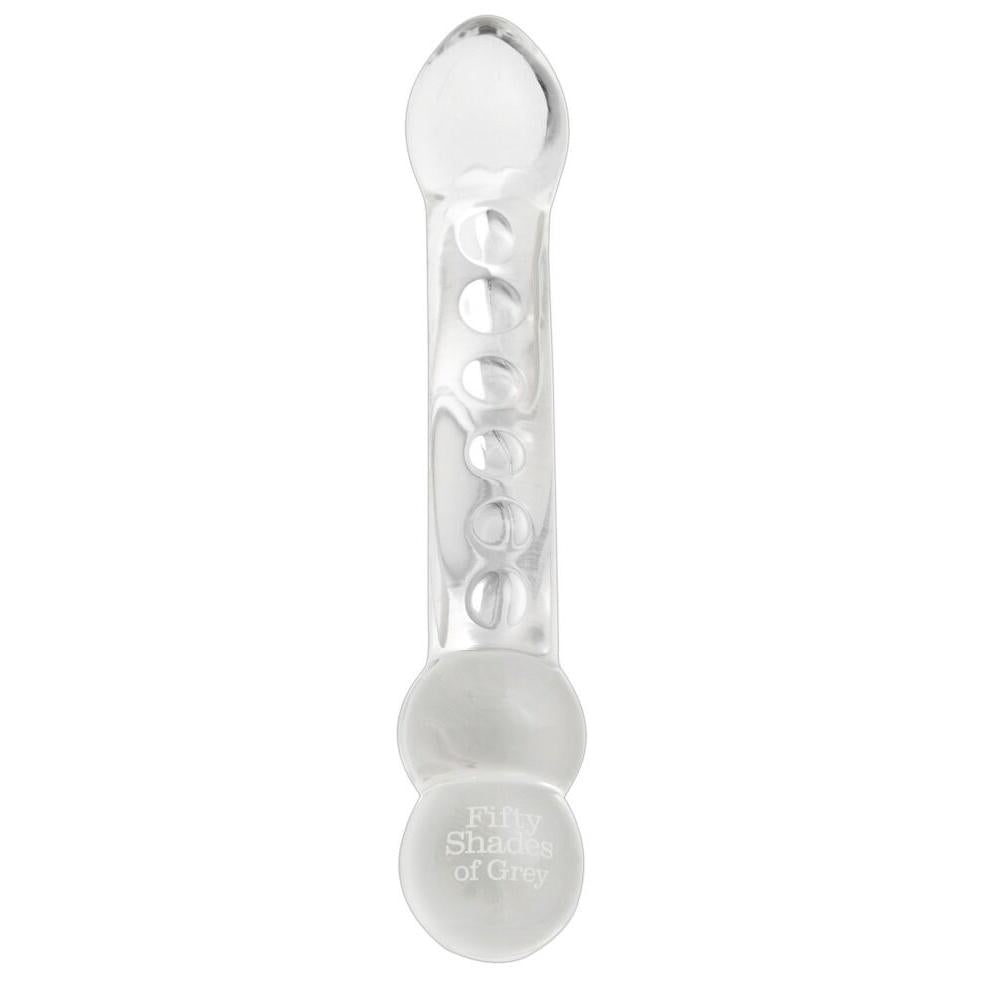 Klar glassdildo med kuleformet design og "Fifty Shades of Grey" logo på basen.
