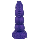Lilla Demon of Desire fantasidildo med metallisk glans, strukturert skaft og sugekopp.