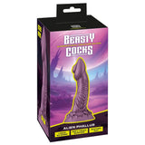 Alien Phallus fantasidildo i lilla Liquid Silicone med strukturert skaft og sugekopp, vist i esken.