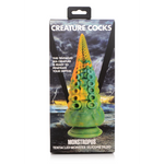 Marmored grønn, blå og gul tentakeldildo med sugekopper, vist i esken med "CREATURE COCKS" logo.