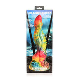 Majestic Merman regnbuefarget silikondildo med S-form, riller og sugekoppbase i eske.