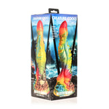 Majestic Merman silikondildo i regnbuefarger med iriserende overflate og S-form, vist i esken.